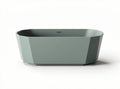 Modern geometric bathtub in green resin measures 70 x 40 x 20cm
